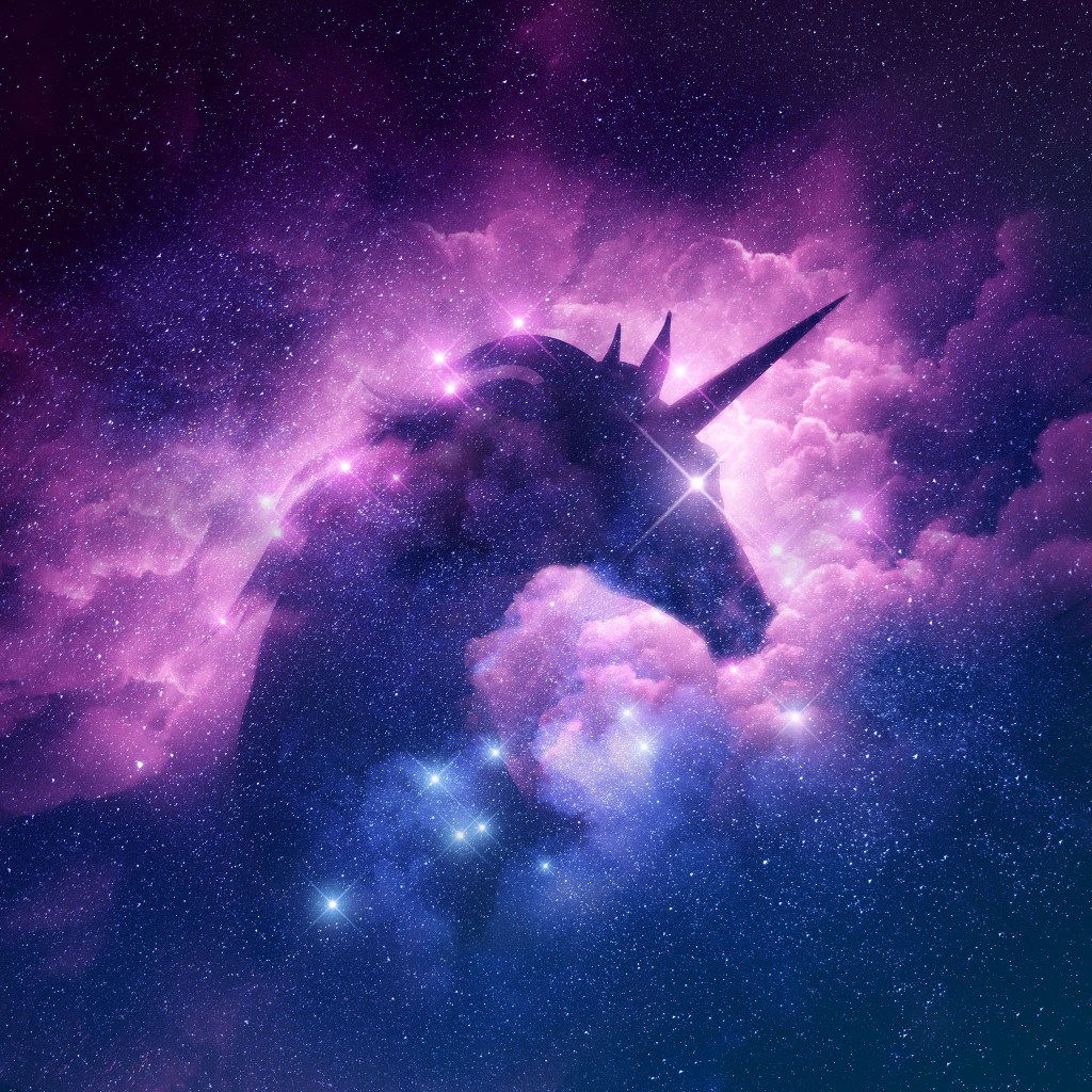 Unicorn in a galaxy nebula cloud